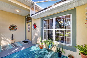 Charming Front Entry with Extended Birdcage