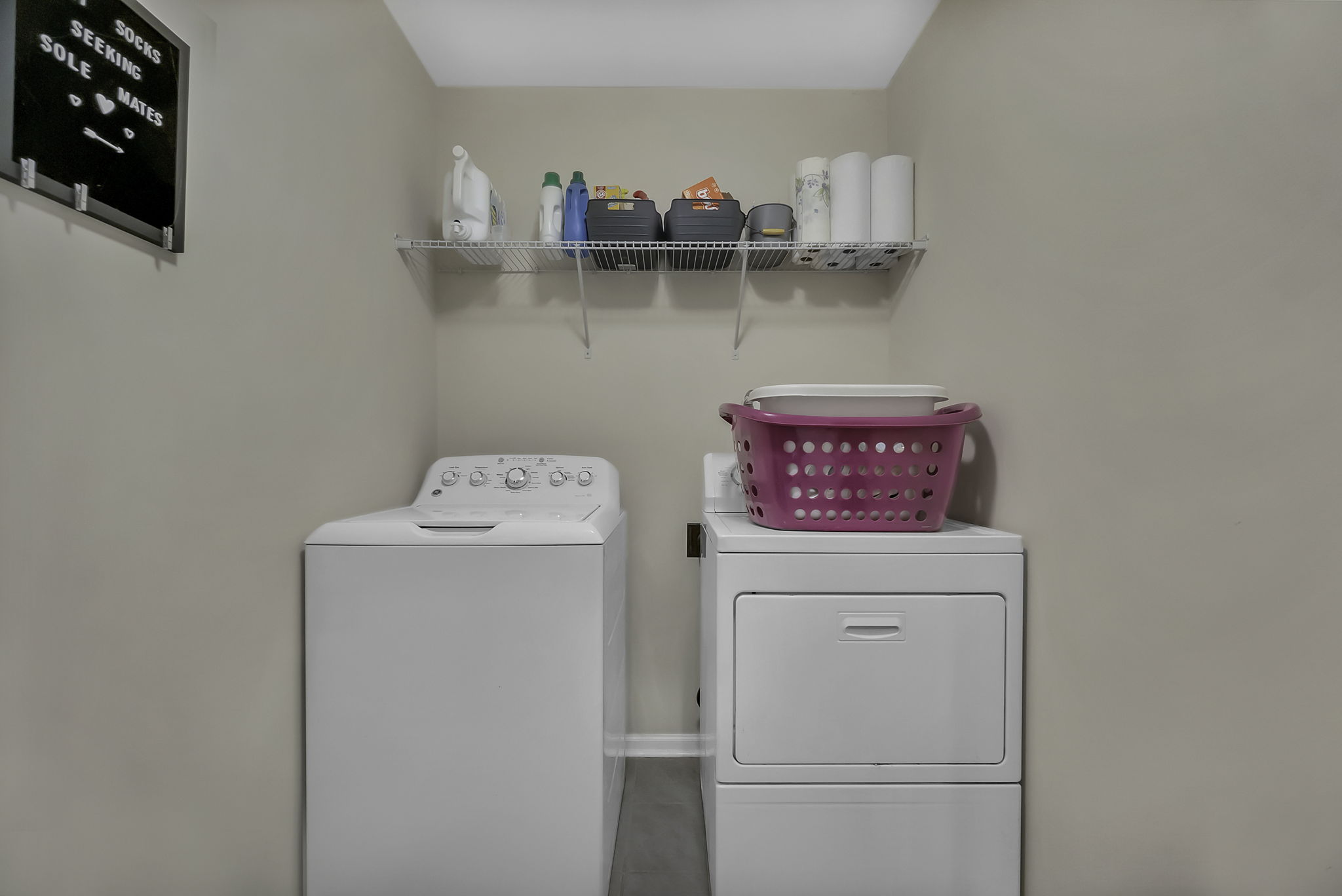Large laundry room conveniently located on upper level.
