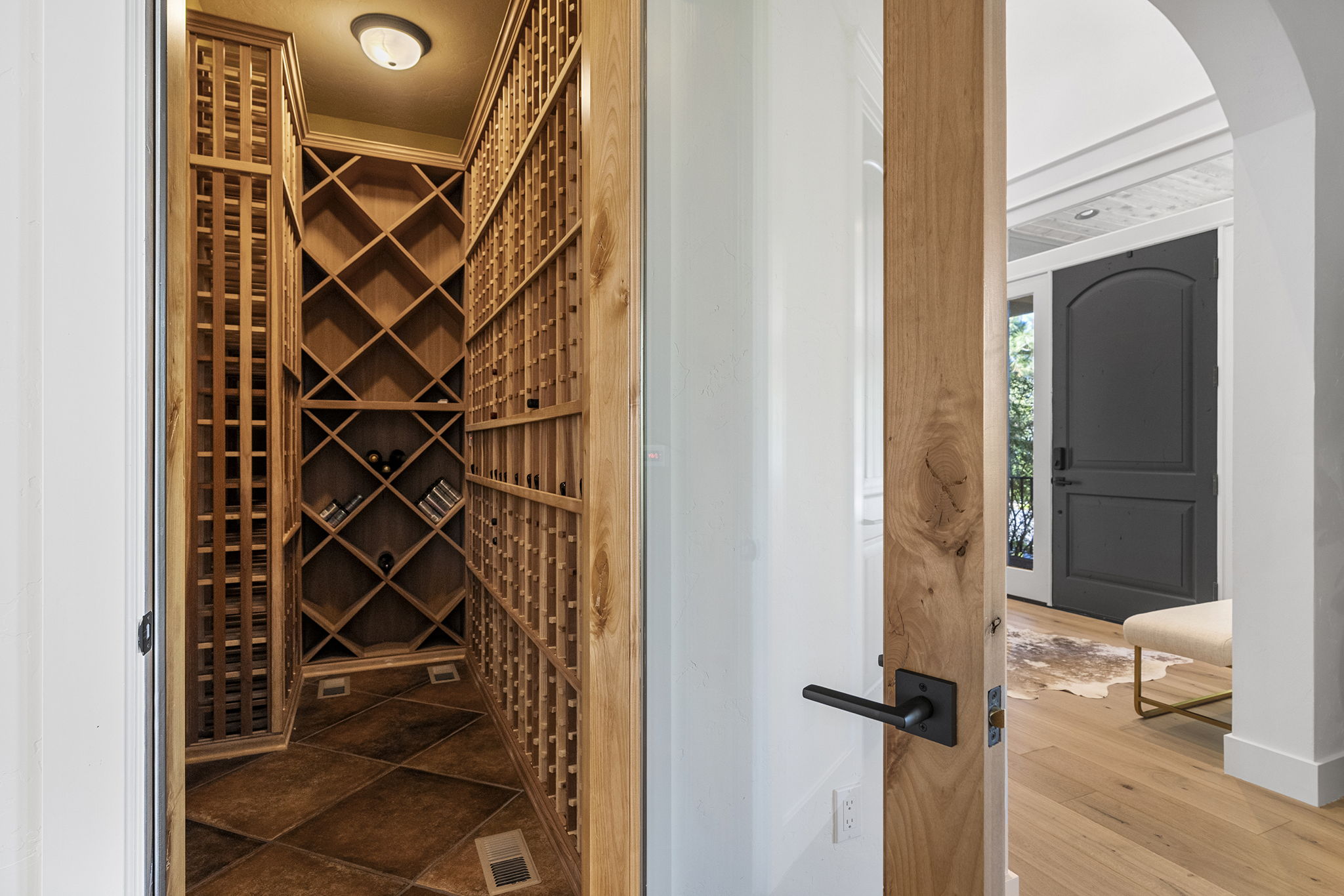 Temperature controlled wine storage with homage to the original style of the home