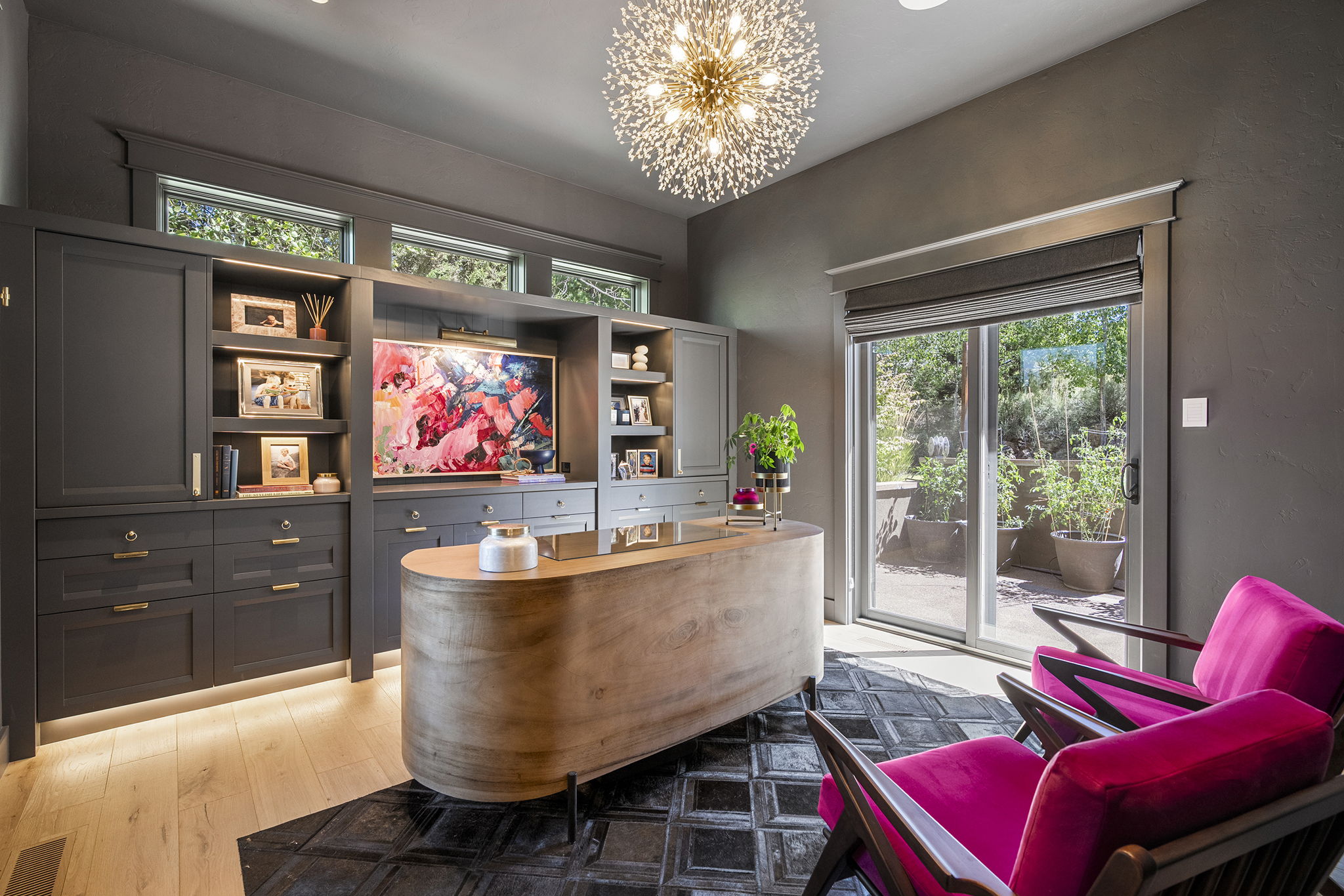 Color drenched home office with built in cabinets