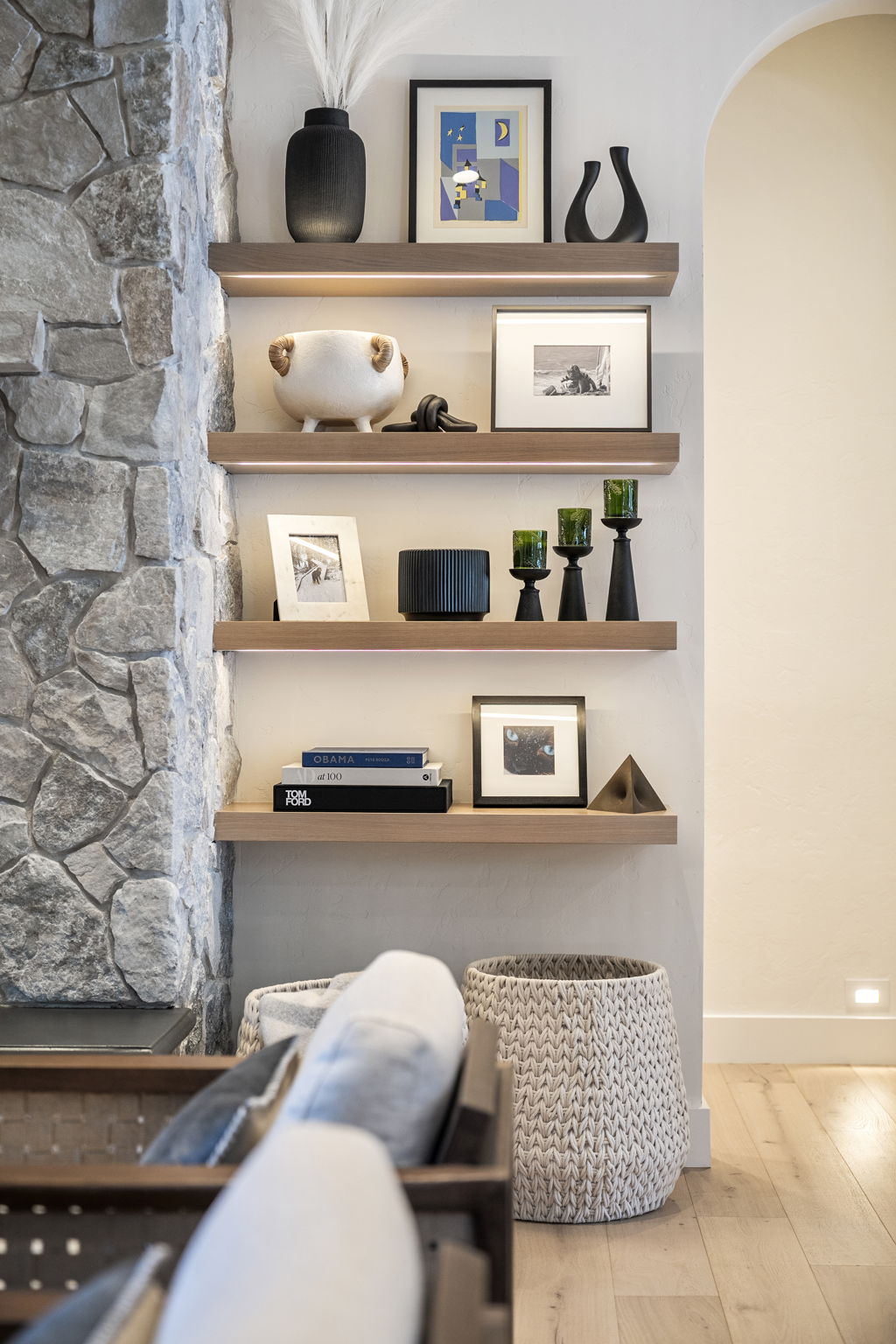 Custom touches like lighted floating shelves