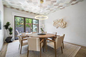 Phillip Jeffries wall covering crowns the dining room
