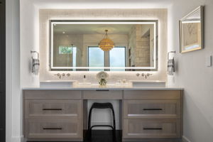 Back and front lit Hollywood mirror and Ann Sacks tile