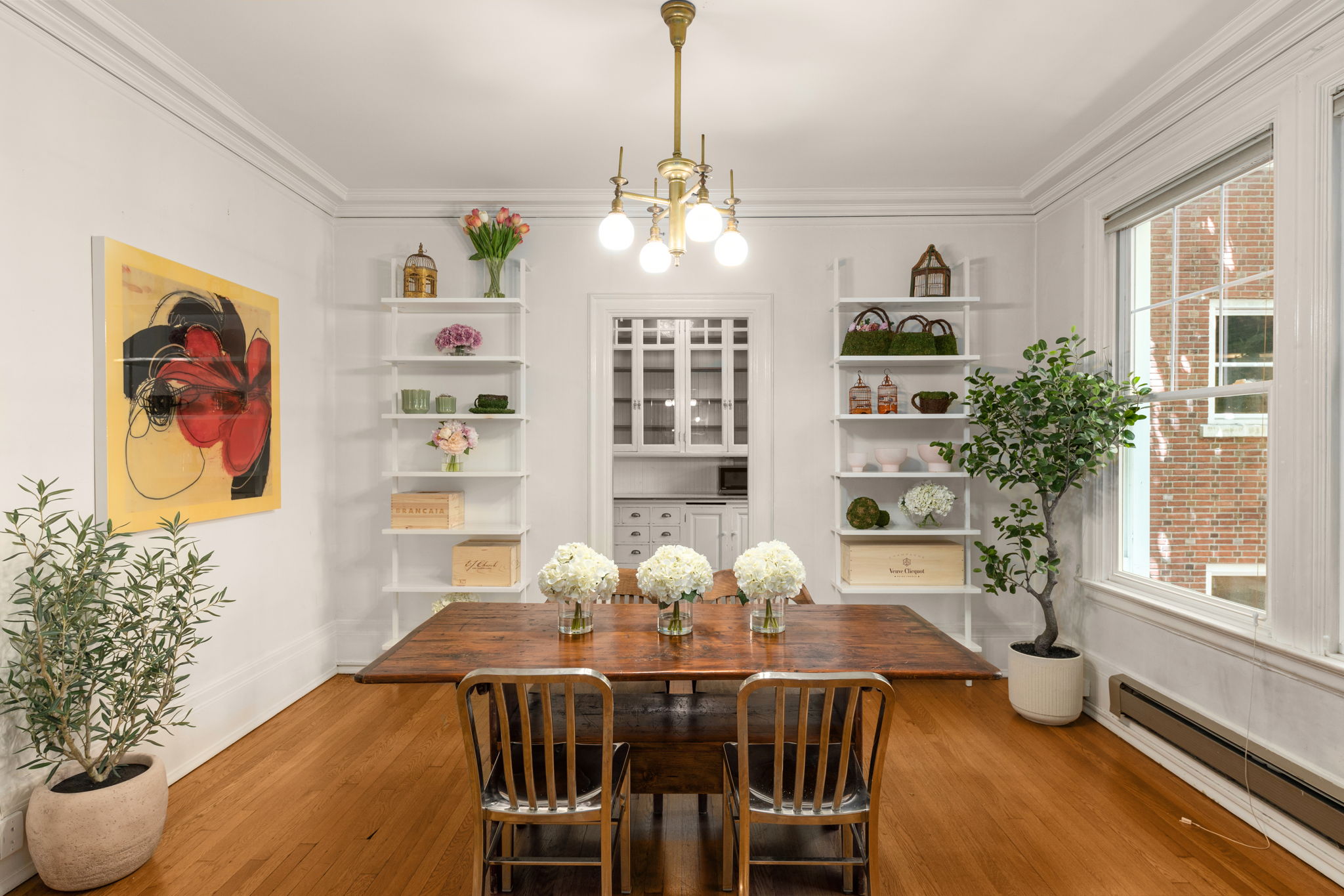 Large dining room with antique chandelier.