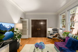 solid wood pocket doors can separate the dining room from the living room