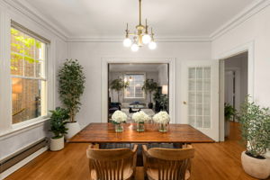 Looking back to the living room, which can be closed off w/ pocket doors or left open to connect to dining room.
