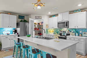 Kitchen with Counter Seating and Pantry