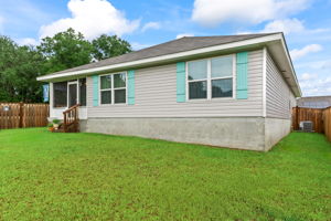 Back of Home and Fenced Yard