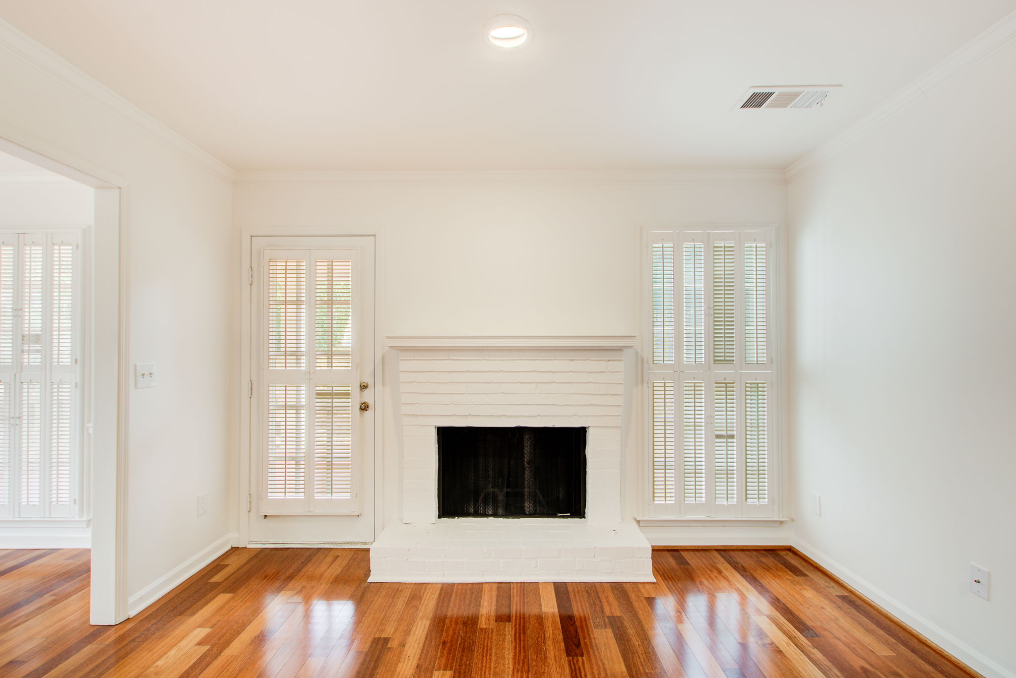 13 Living Room B Fireplace Detail + Walkout