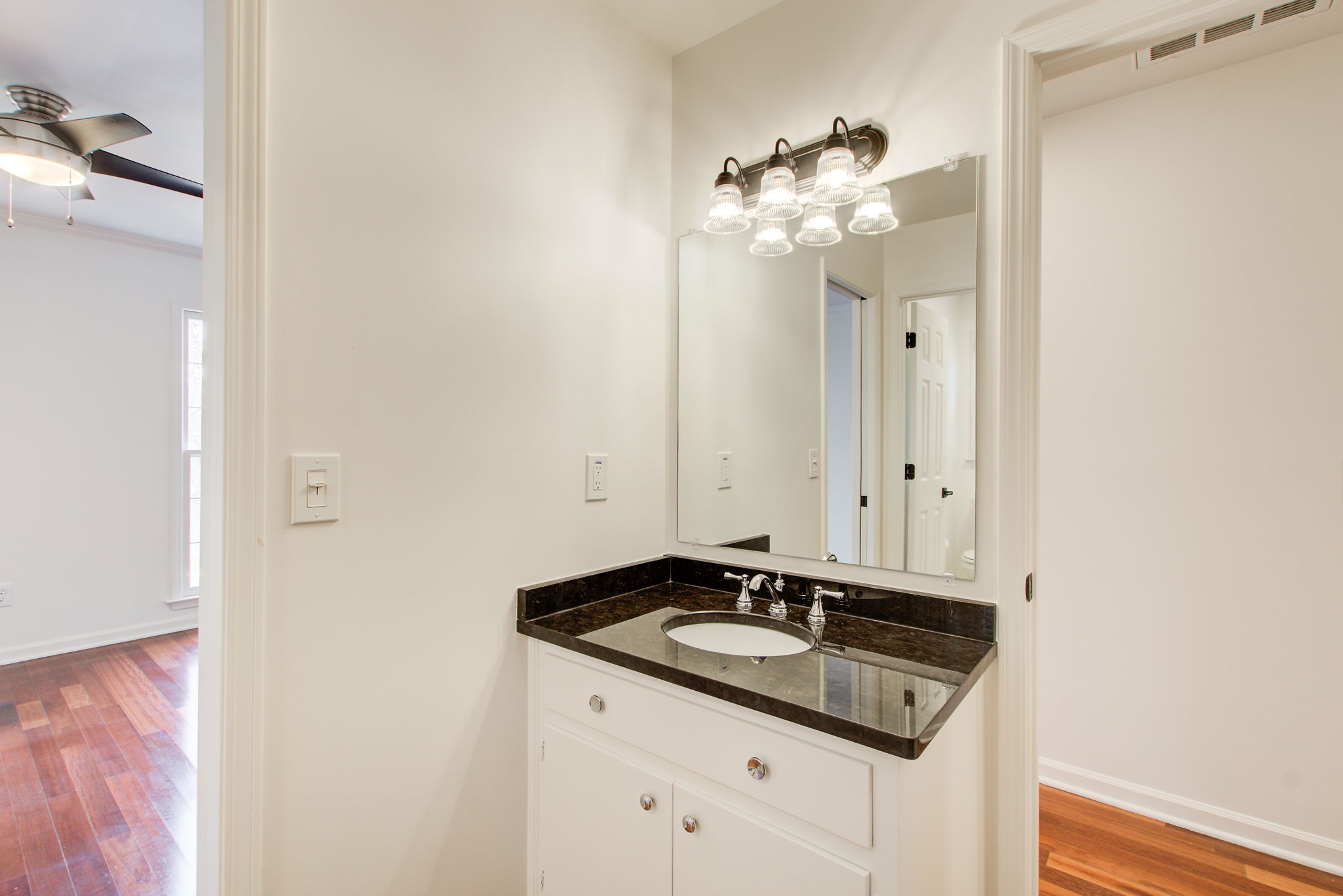 25 Shared Full Bath A Vanity w BR + Hallway