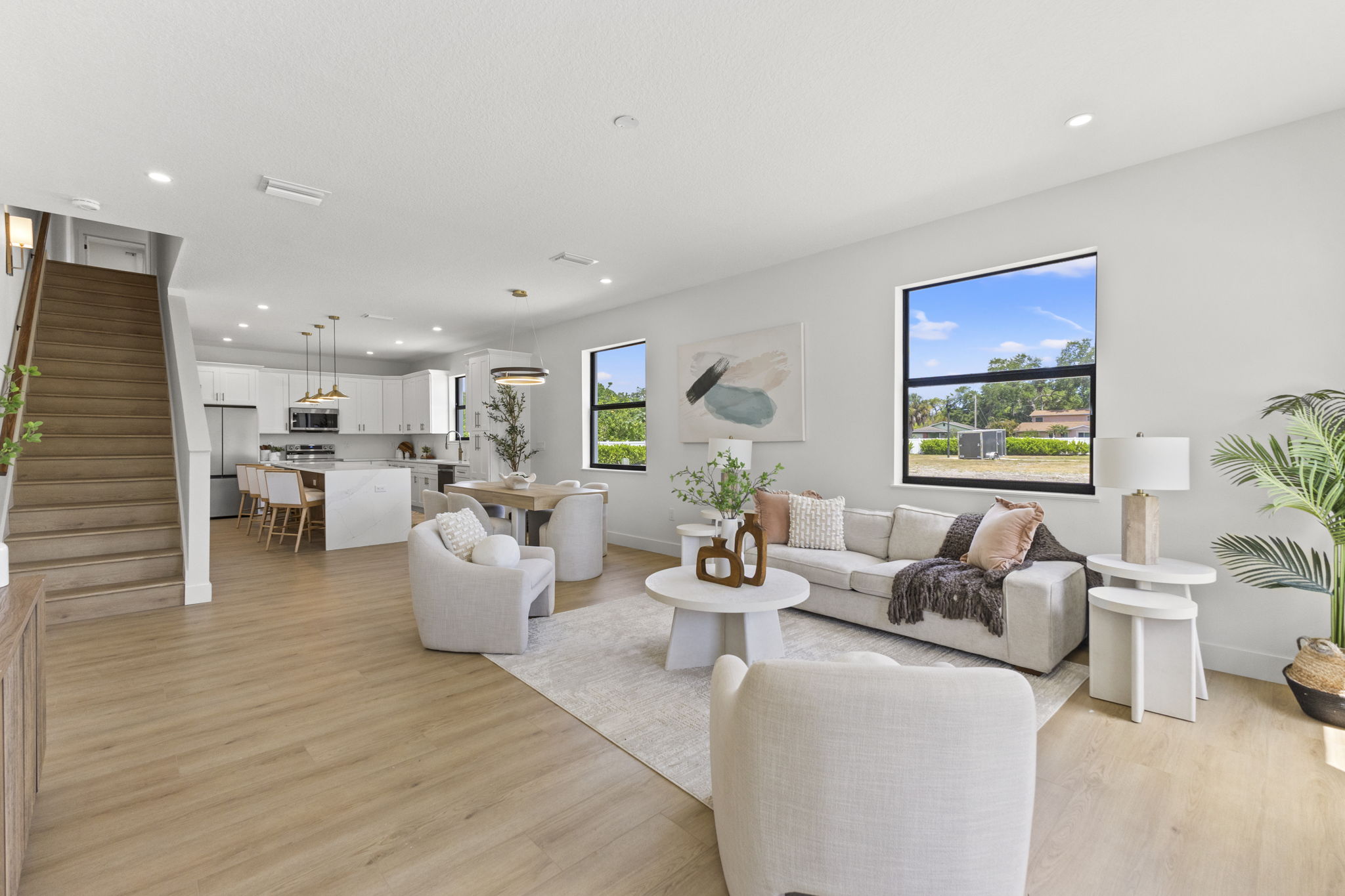 Open living with the stair to the upper floors at Latitudes in the Park, Pinellas Park FL
