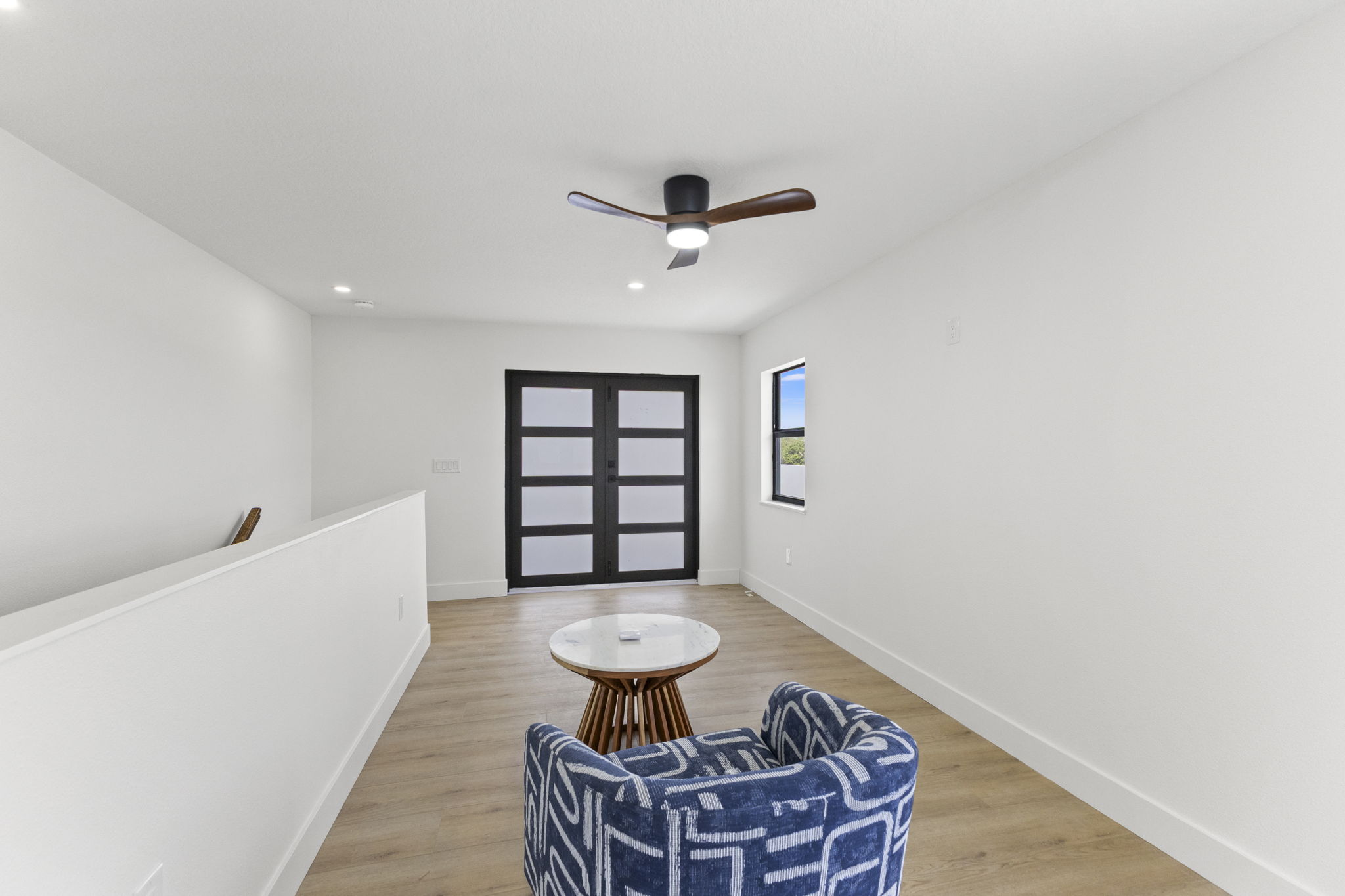 Third-floor loft opening onto the rooftop terrace at Latitudes in the Park