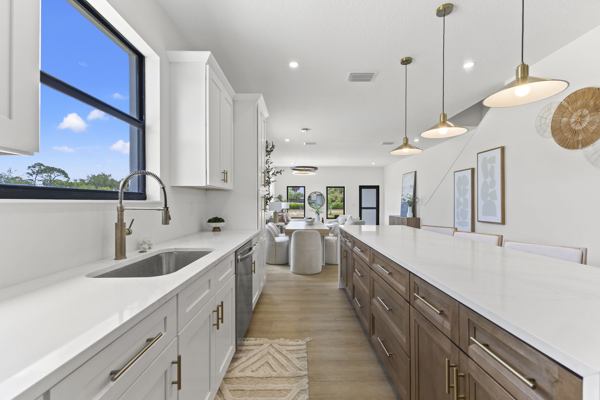Kitchen sink and the view down the great room at Latitudes in the Park, Pinellas Park FL