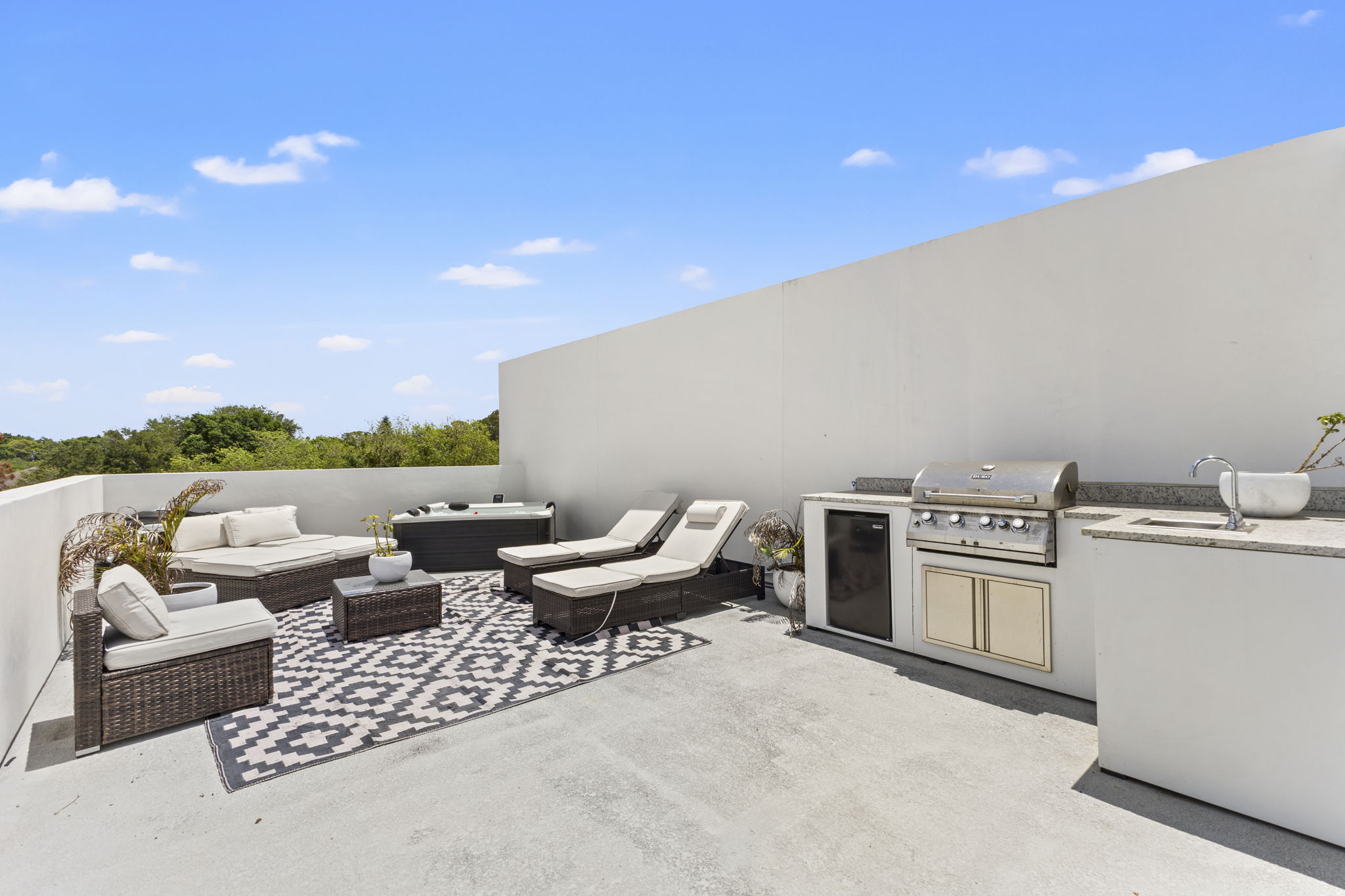 Rooftop lounge and outdoor kitchen at Latitudes in the Park, Pinellas Park FL