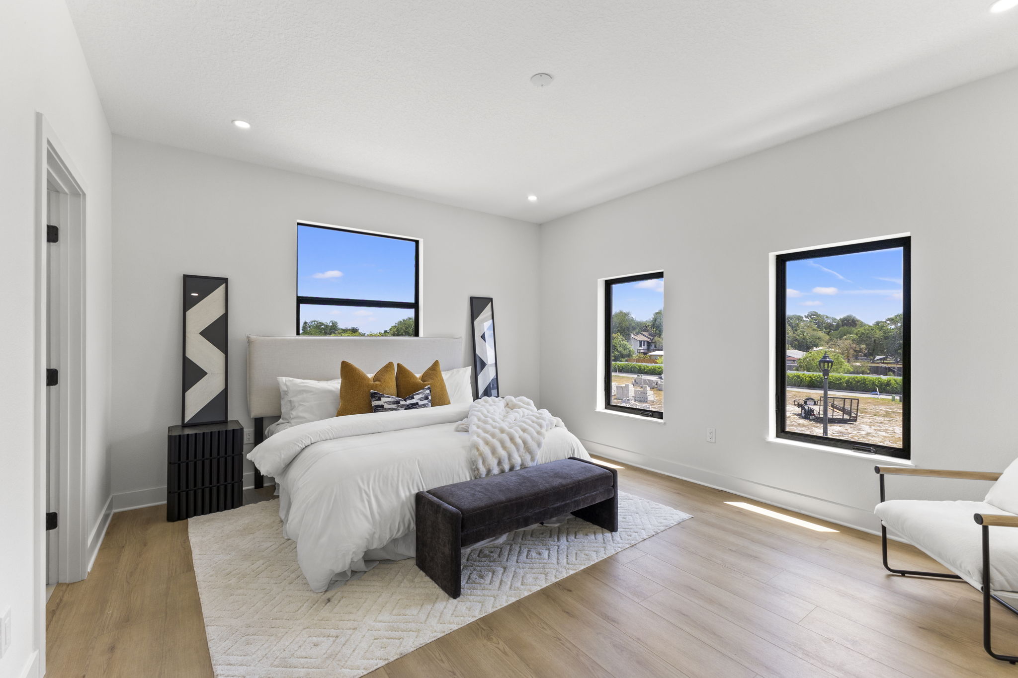 Primary bedroom suite on the second floor of a Latitudes in the Park residence in Pinellas Park, FL