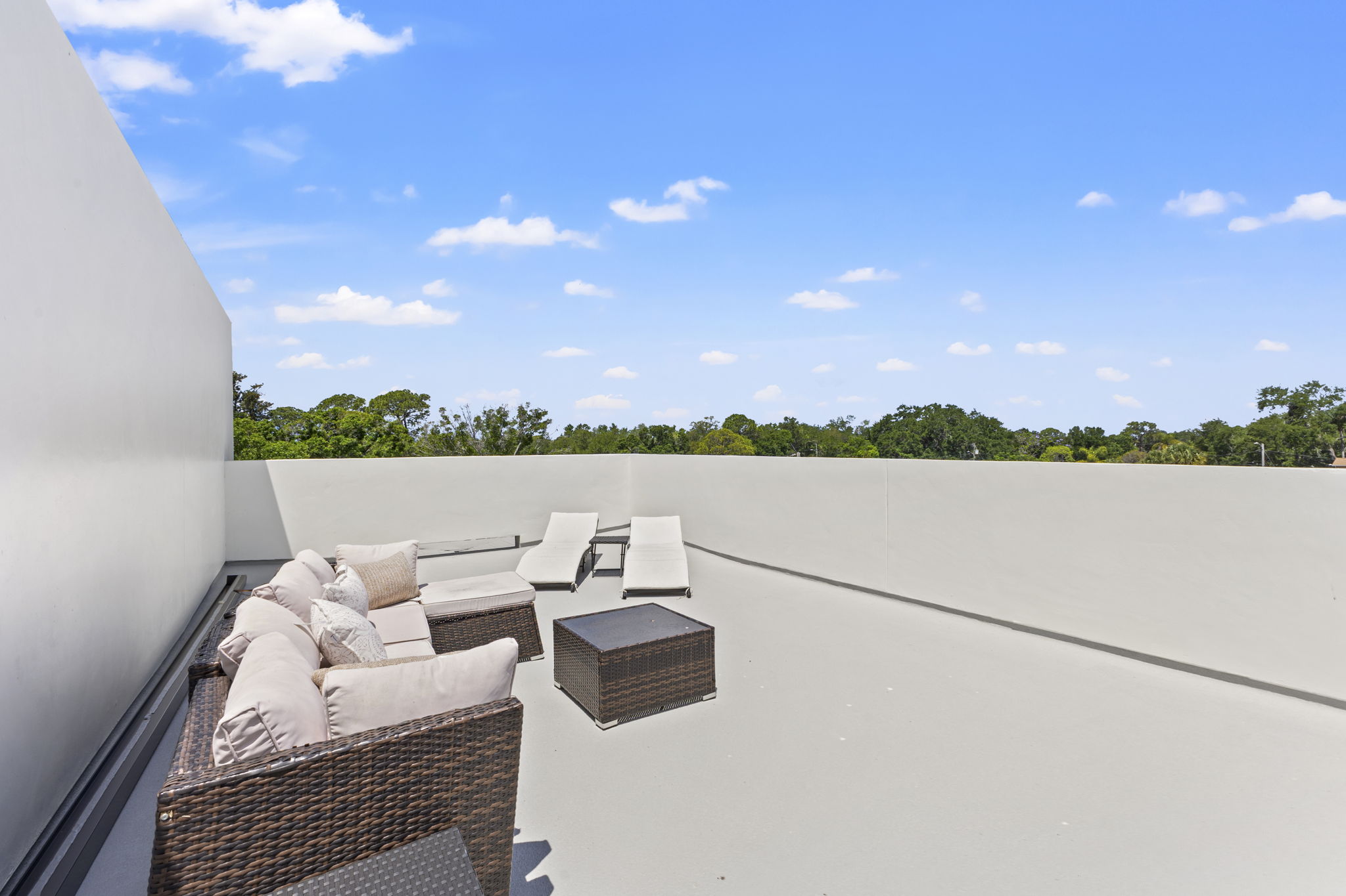 Private rooftop terrace lounge above a residence at Latitudes in the Park, Pinellas Park FL