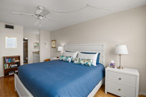 Primary bedroom with king bed and ensuite bathroom