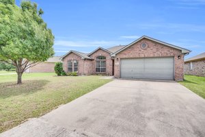Well maintained four bedroom home in Mansfield's Ember Creek Estates