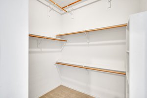 Primary closet hosts plenty of storage options