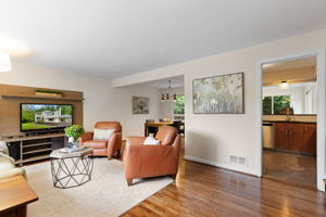 Living room with bay window & hardwood floors!