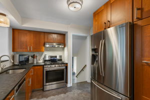 Updated kitchen w stainless steel appls & granite counters