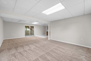 Lower Level Recreation Room with Access to Rear