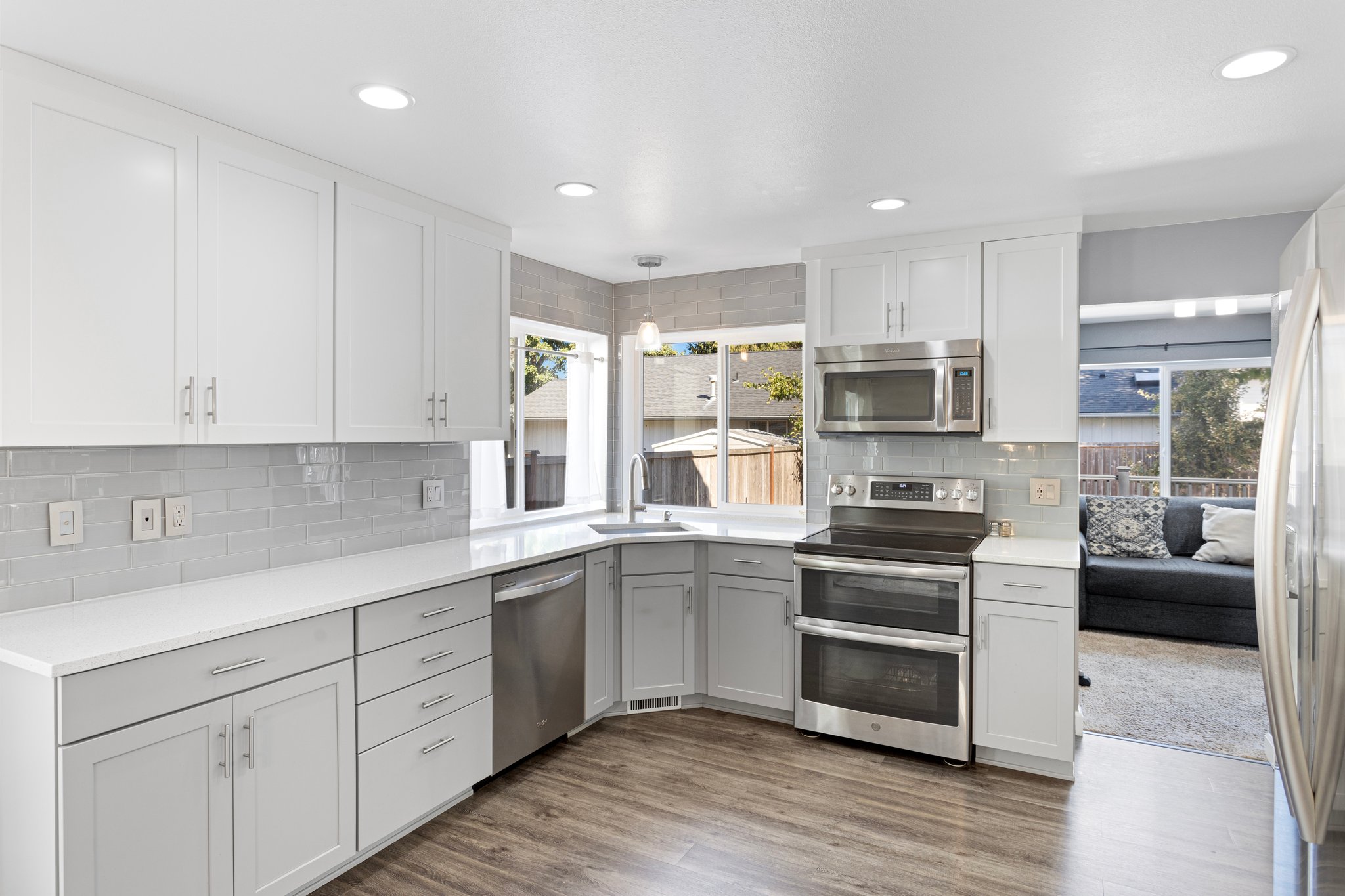 Kitchen w/ sink range counter view