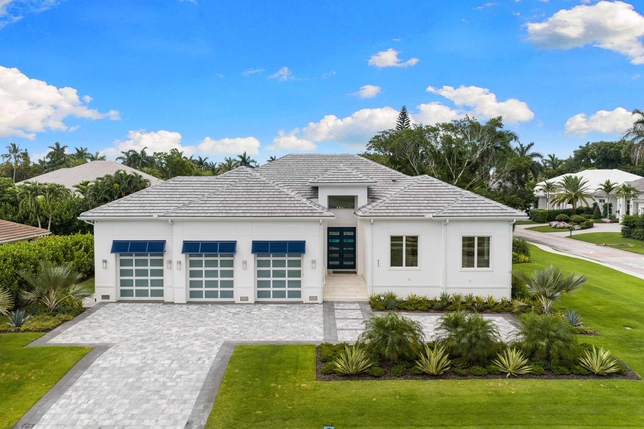 Oversized corner lot with a large grassy side yard