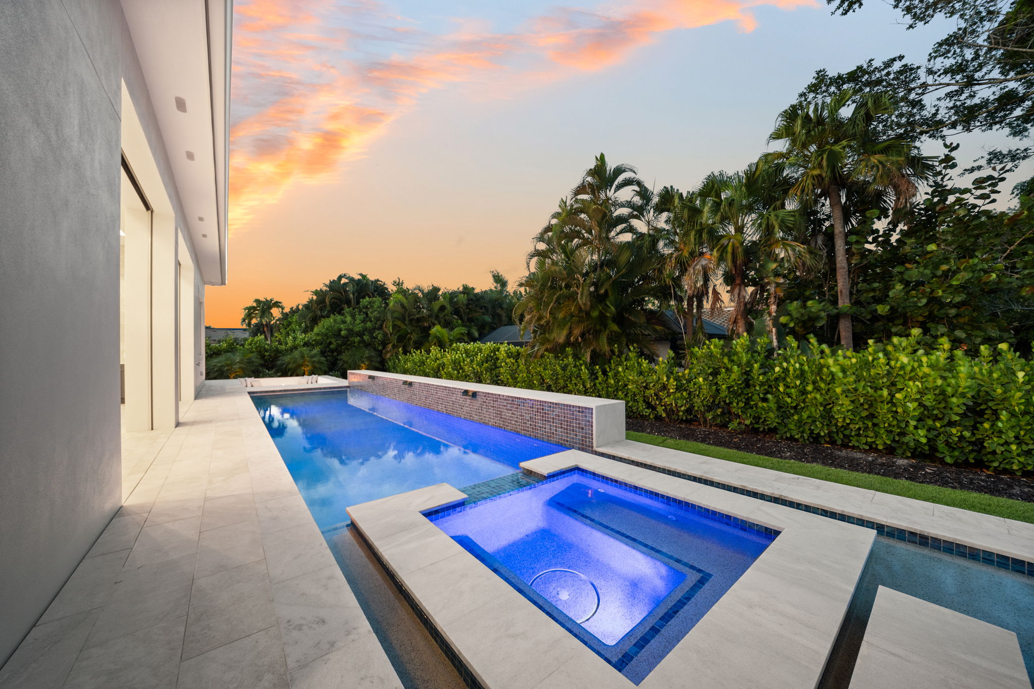 Raised spa with decorative tiles