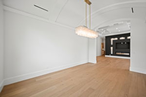 Dining room featuring an elegant barrel-domed ceiling detail
