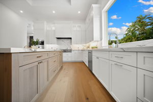 WoodHarbor Bevel Shaker cabinets in white and natural tones