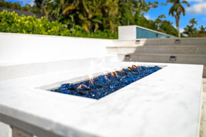 Gas fire pit with wraparound seating for effortless outdoor entertaining