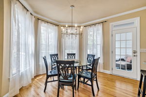 Spacious and circular breakfast room is perfect for casual meals.