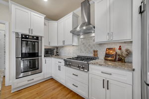 A Chef's kitchen with well appointed S.S. appliances!