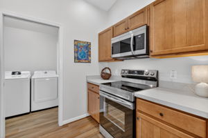 Kitchen with Interior Laundry Room Hidden Behind Pocket Door