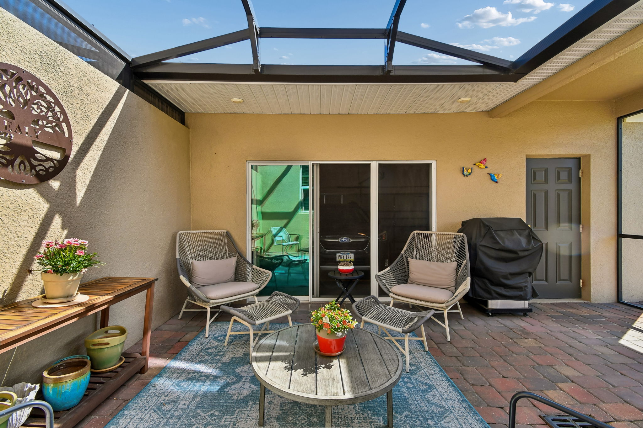 Great cross breeze via garage screens and side yard