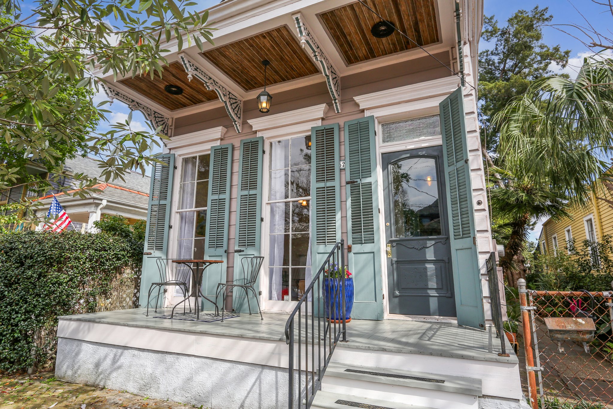 This pre-1883 three-bay shotgun home boasts Victorian embellishments and an inviting front porch