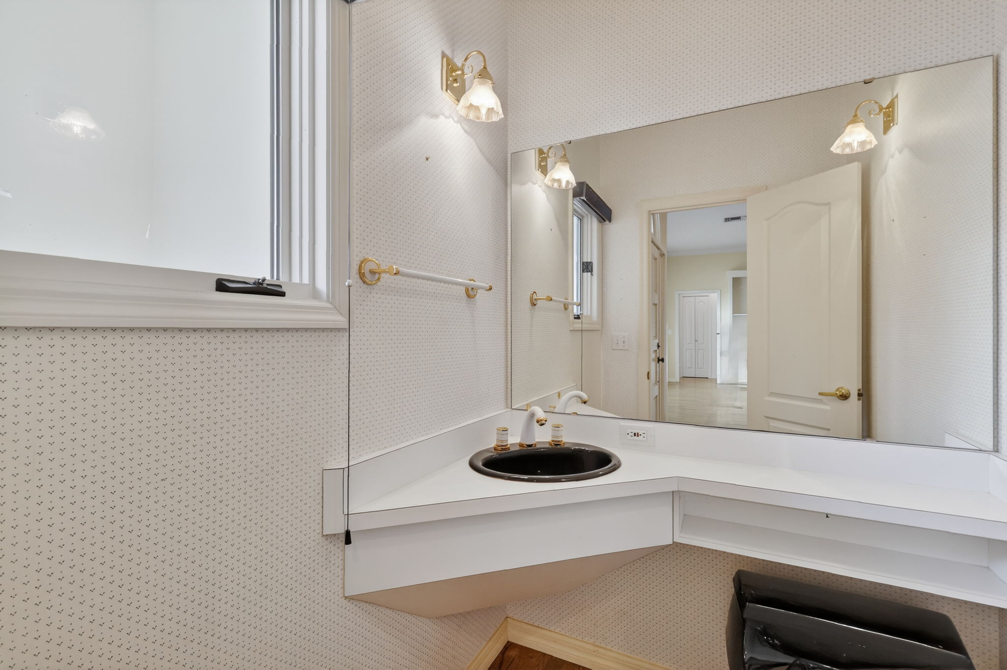 Half Bath at front entrance foyer