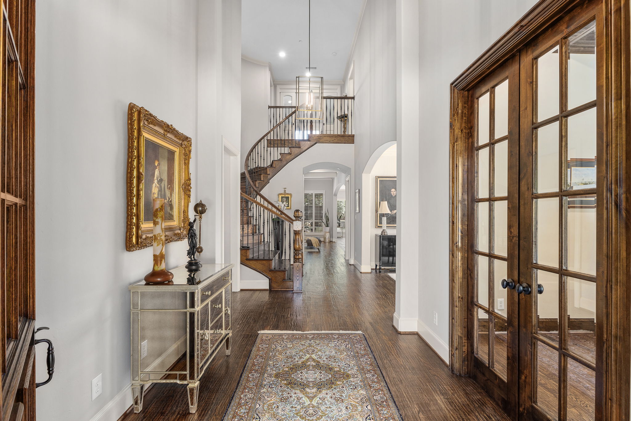 Entry foyer with soaring ceilings and at-home office