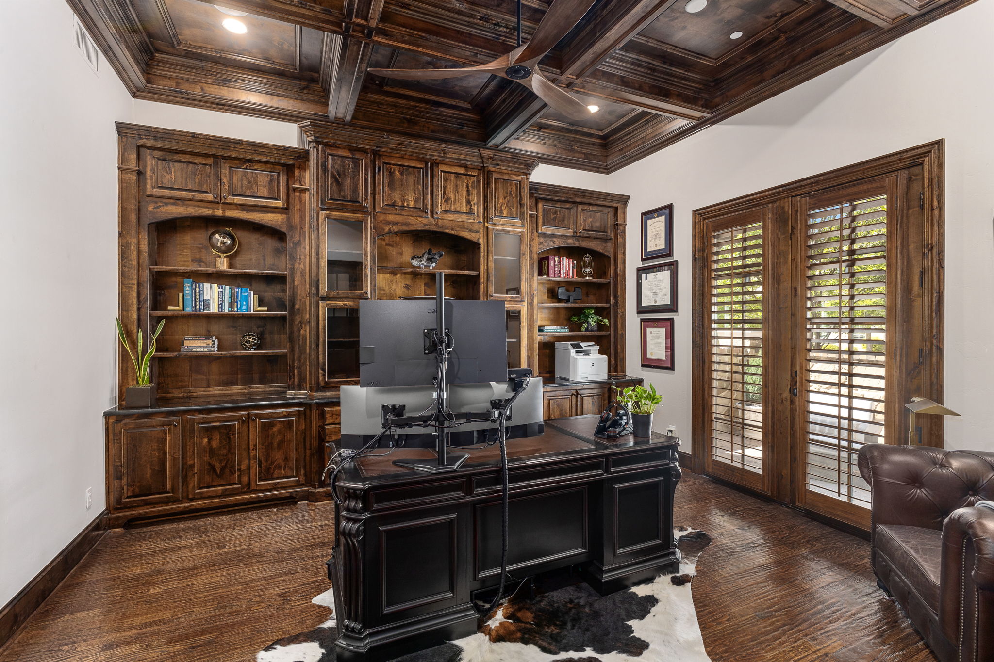 At-home office with coffered ceilings and private outdoor patio