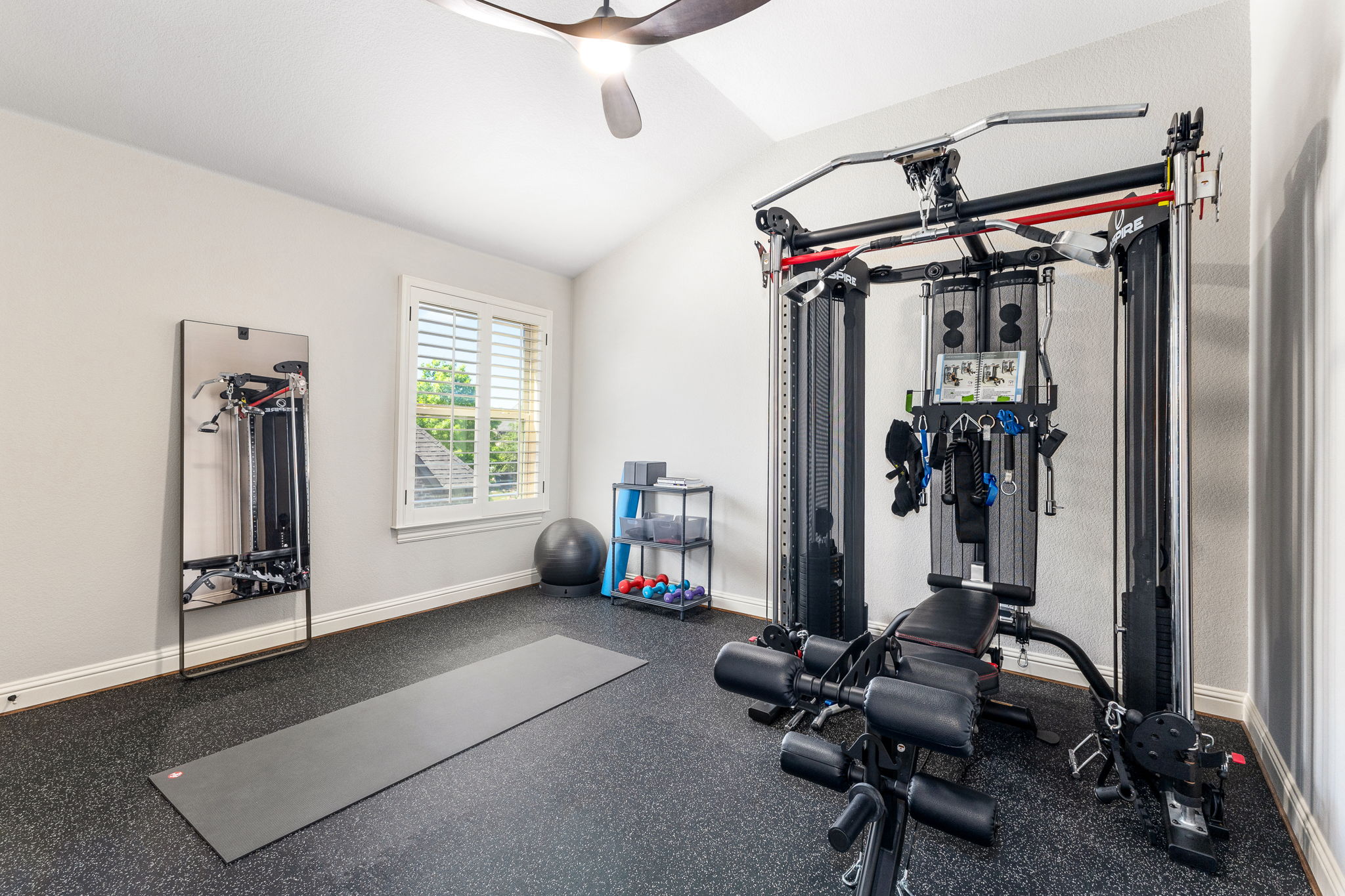 2nd story gym and/or bedroom with walk-in closet (easily removable custom Regupol mat flooring sit over hardwood floors)