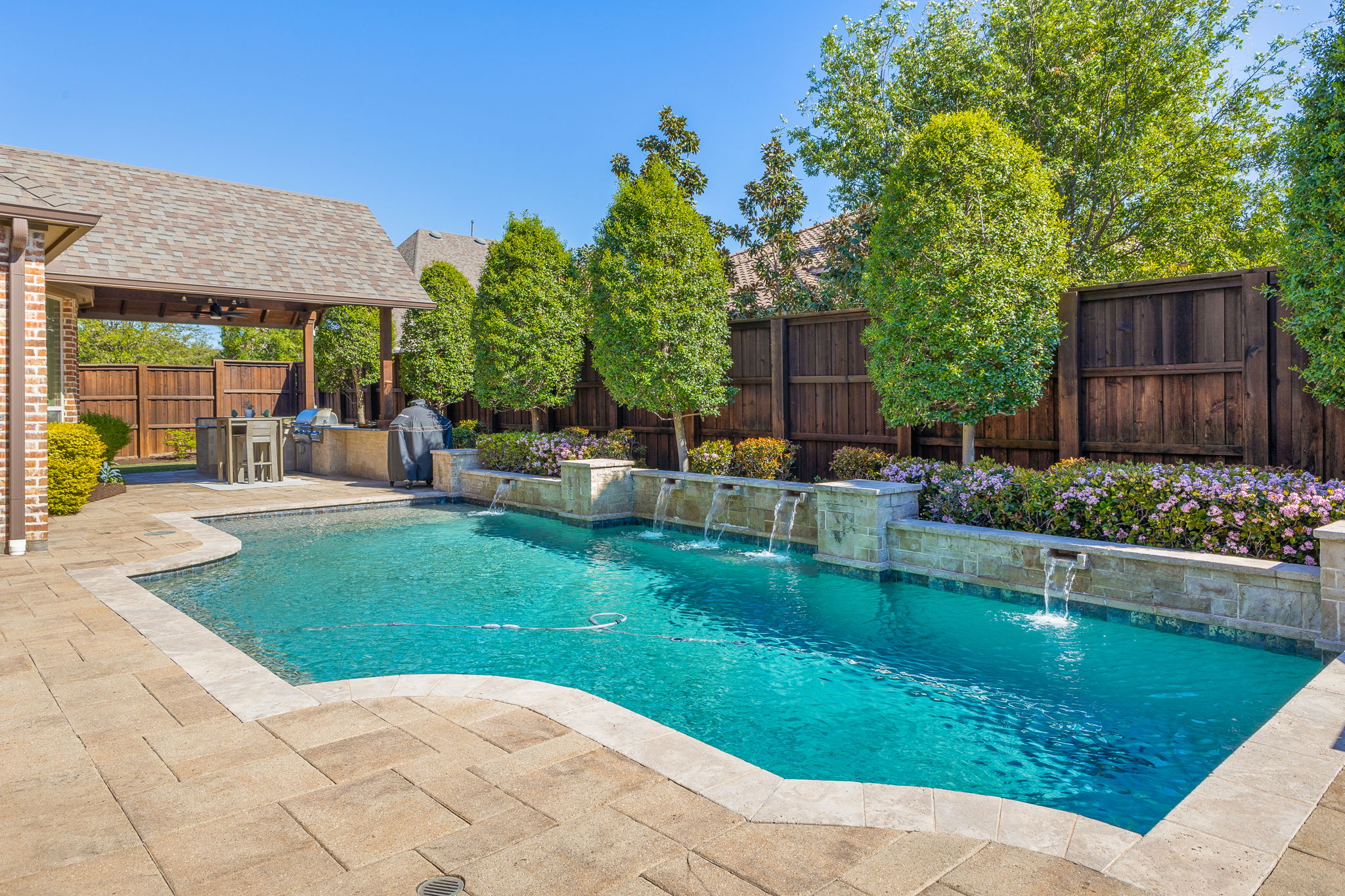 Resort-style pool and outdoor kitchen