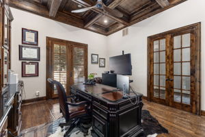 At-home office with French doors, coffered ceilings and private outdoor patio