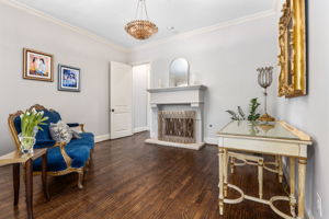 Fireplace in primary suite sitting area