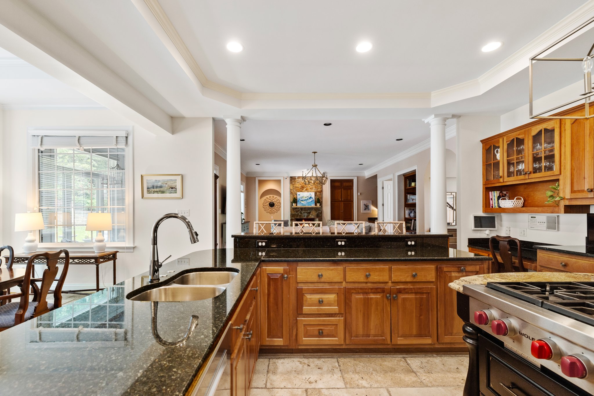 Open concept kitchen, breakfast room, and family room.