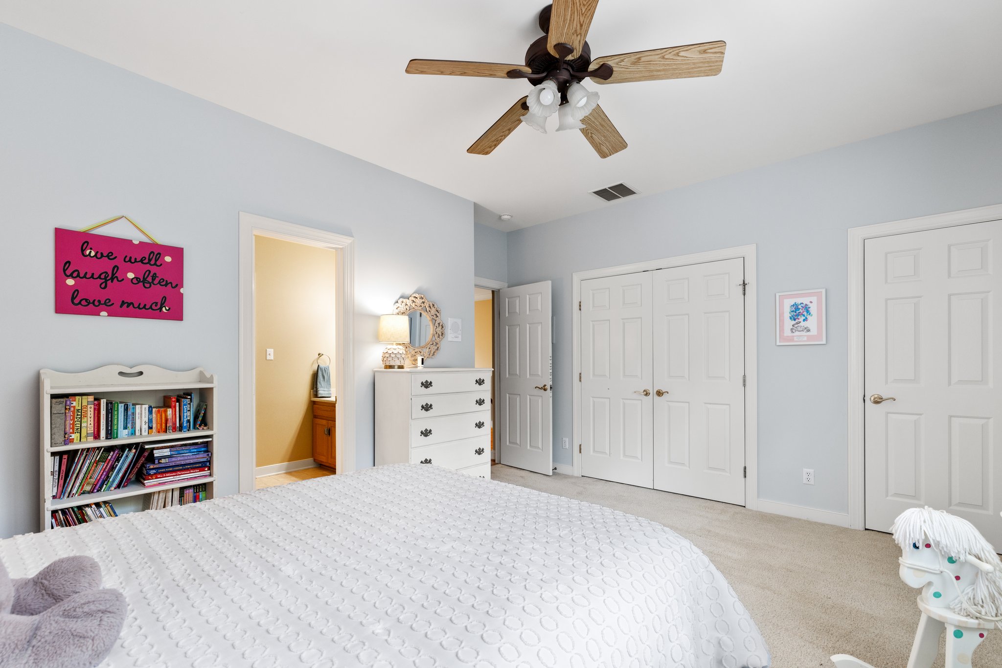 Bedroom 4 has 3 large closets and ceiling fan.