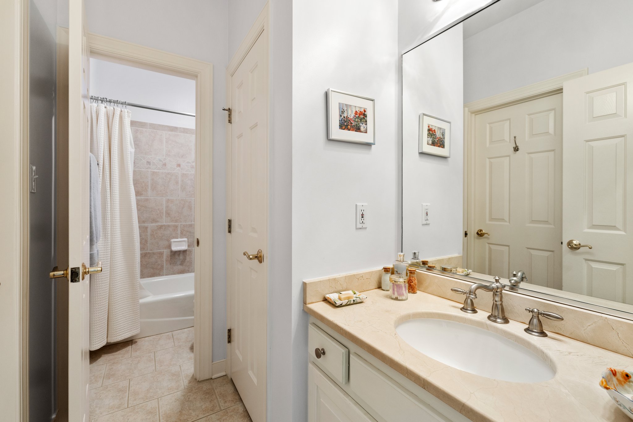 Bedroom 5 en-suite bath with large linen closet.