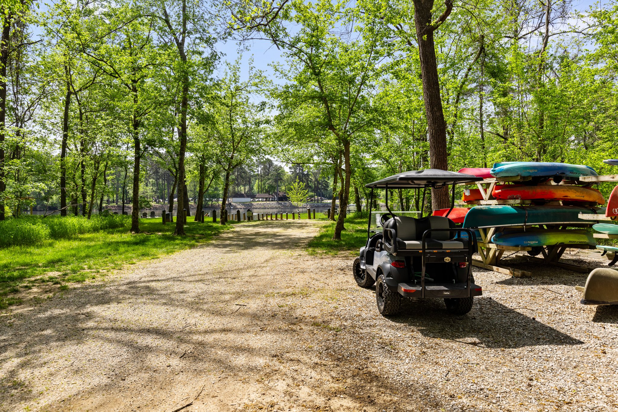Drive your very own golf car down to the river.