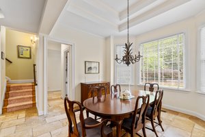 Rear stair case to 2nd floor just off the kitchen and mud room.