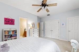 Bedroom 4 has 3 large closets and ceiling fan.